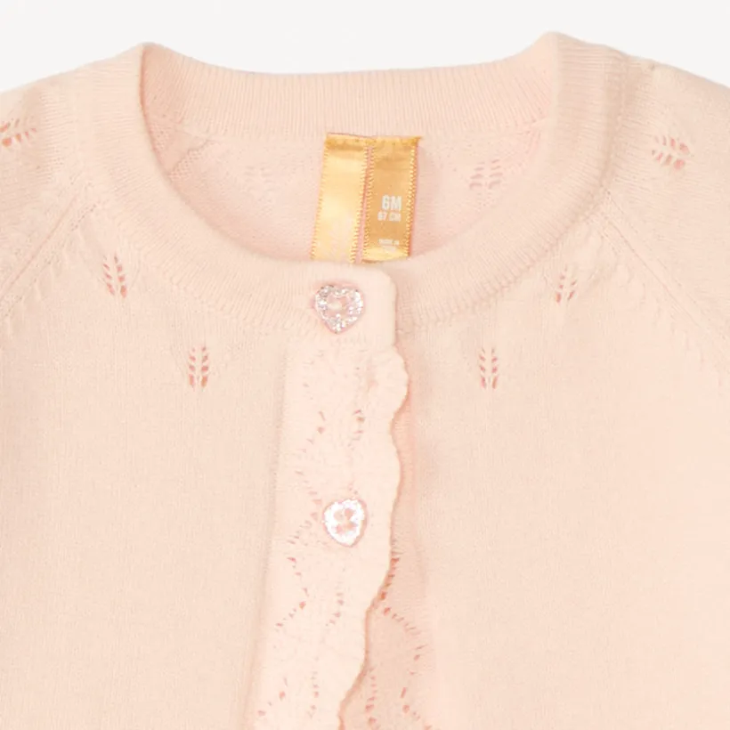 Boléro en tricot festonné pour bébé fille