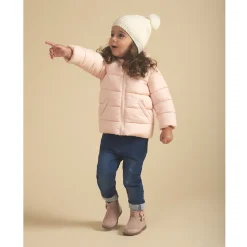 Bonnet en tricot et pompons en fausse fourrure