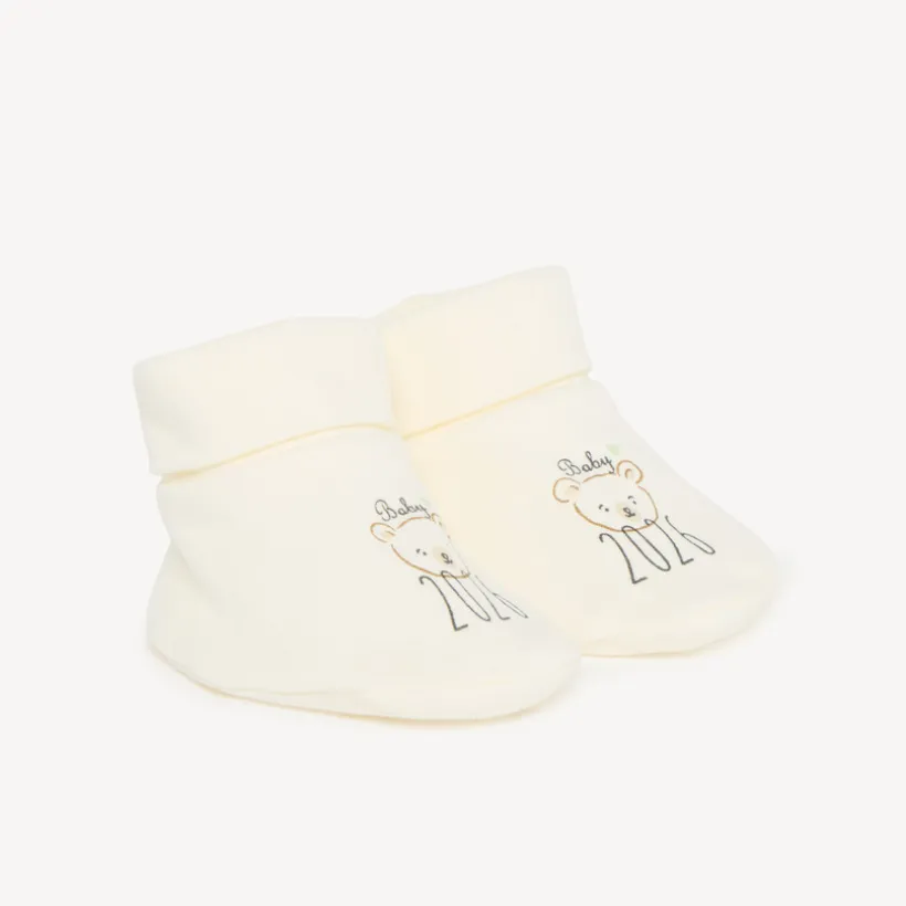 Chaussons naissance en interlock "Baby 2026"