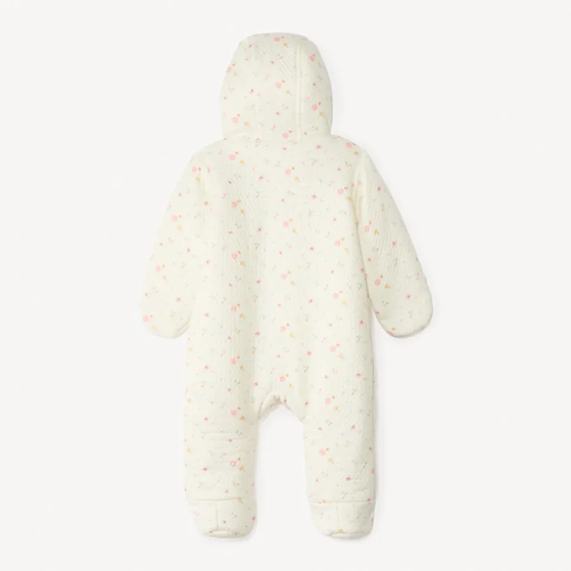 Combi-pilote imprimé fleuri pour bébé fille avec finitions différentes selon l'âge