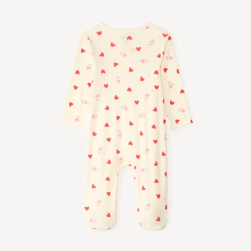 Dors-bien en maille pointel avec imprimé cœur pour bébé fille (ouvertures différentes selon l'âge)