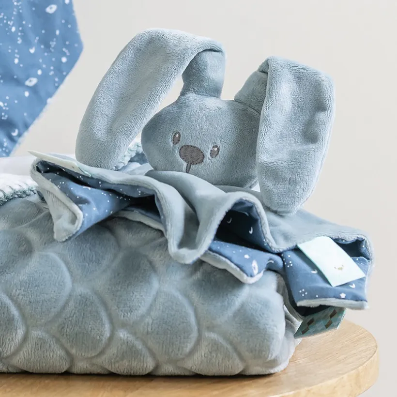 Doudou plat lapin Lapidou bleu ciel avec imprimé phosphorescent