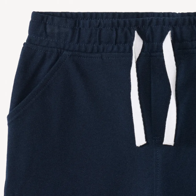 Ensemble 2 pièces polo manches courtes + short imprimé palmiers pour bébé garçon