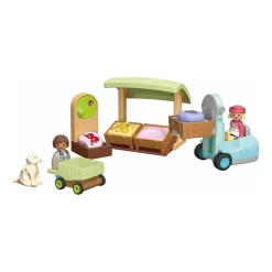 Figurine avec étal de fruit et légumes bio