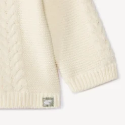 Gilet en tricot torsadé et doublé jersey pour bébé