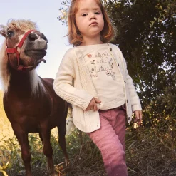 Gilet en tricot torsadé fantaisie forme poncho pour bébé fille