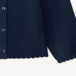 Gilet en tricot uni festonné pour bébé fille
