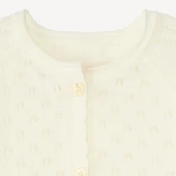 Gilet style boléro en tricot ajouré pour bébé fille