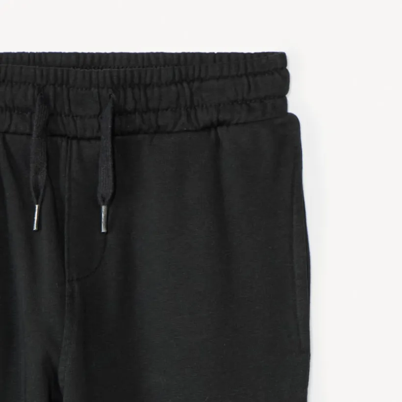 Jogging molleton uni brodé pour garçon