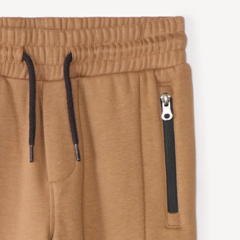 Jogging molleton uni à poches zippées pour garçon