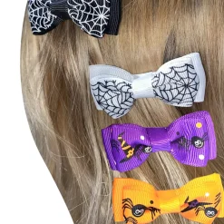 Lot de 4 barrettes nœuds Halloween (coloris aléatoire)