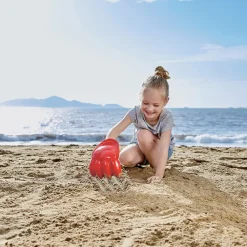 Patte puissante rouge pour la plage
