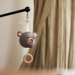 Peluche musicale ourson en tricot