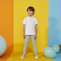 Polo manches courtes uni en coton piqué pour garçon