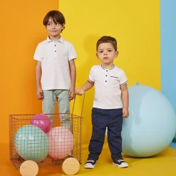 Polo manches courtes uni en coton piqué pour garçon