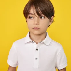 Polo manches courtes uni en coton piqué pour garçon