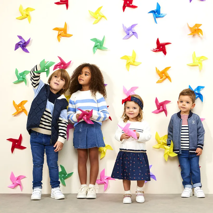 Pull en tricot rayé avec emmanchures ajourées pour fille