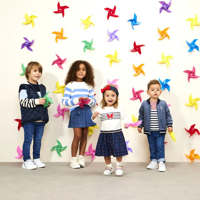 Pull en tricot rayé avec emmanchures ajourées pour fille