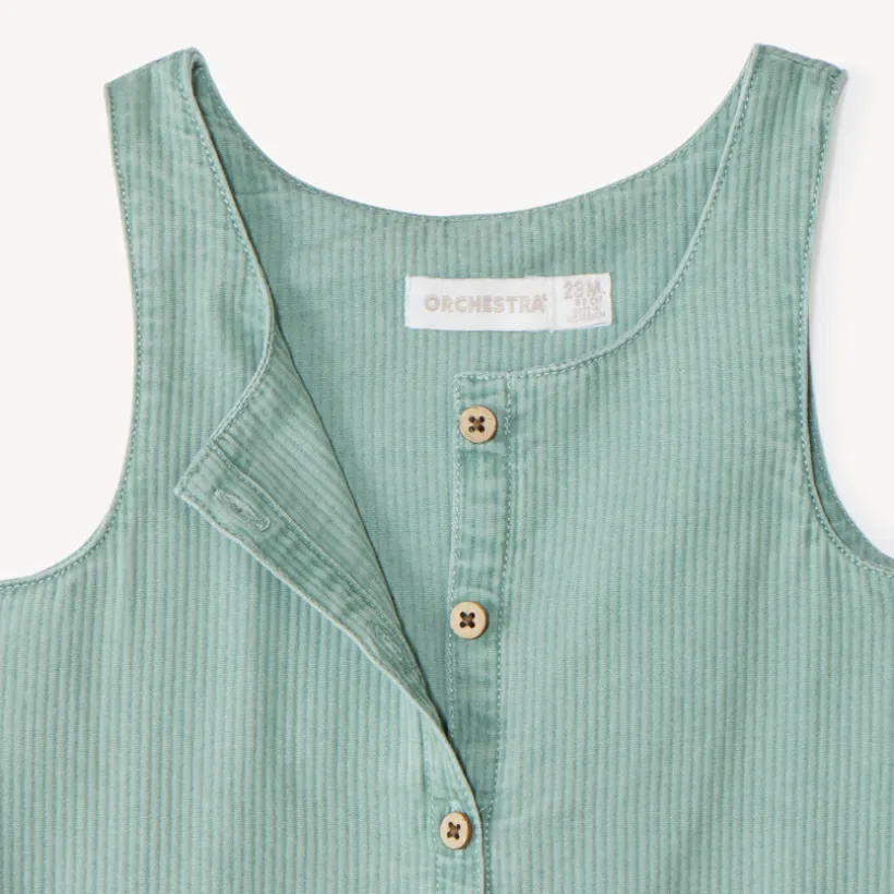 Salopette courte bébé fille en toile à broderie fleurie