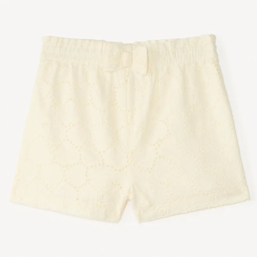 Short uni en broderie anglaise et nœud fantaisie pour bébé fille