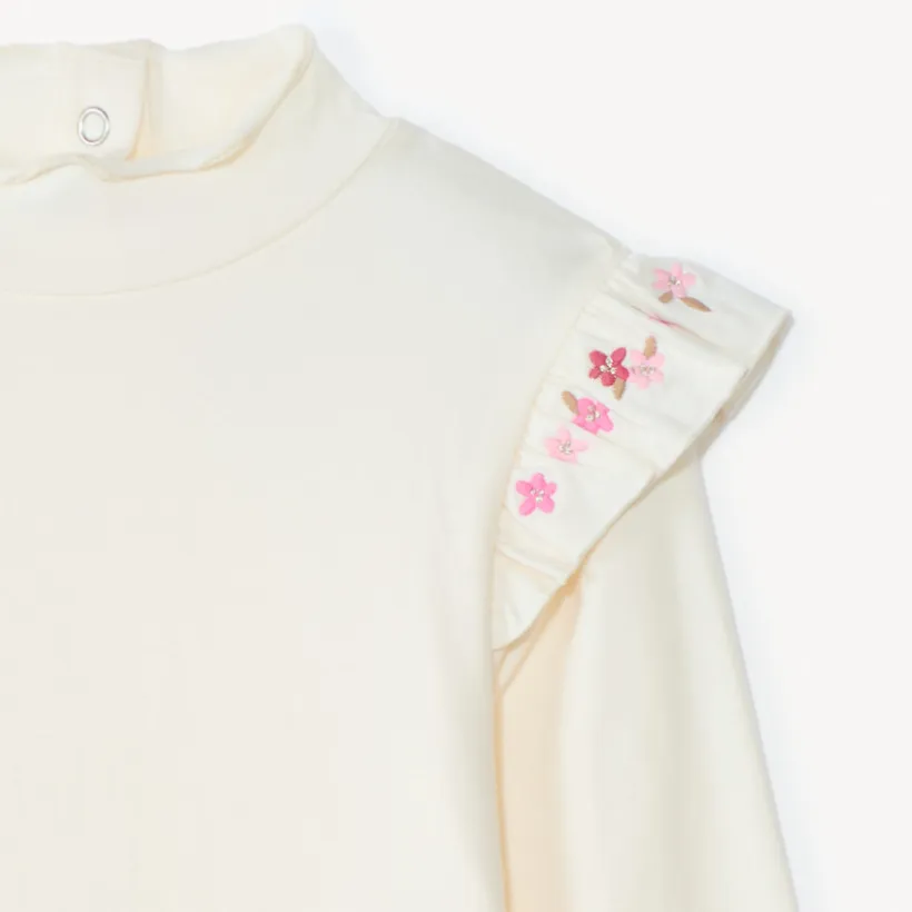 Sous-pull à col cheminé et manches volantées pour bébé fille