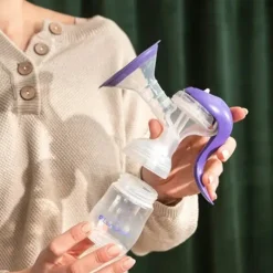 Tire-lait manuel avec accessoires violet